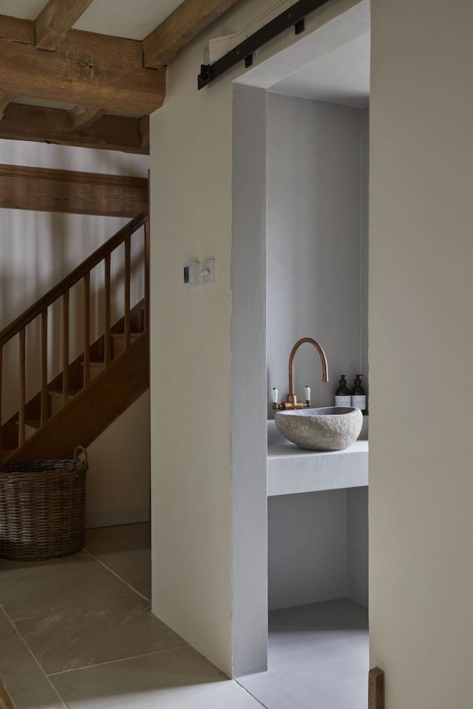 View of a microcement bathroom in a period property