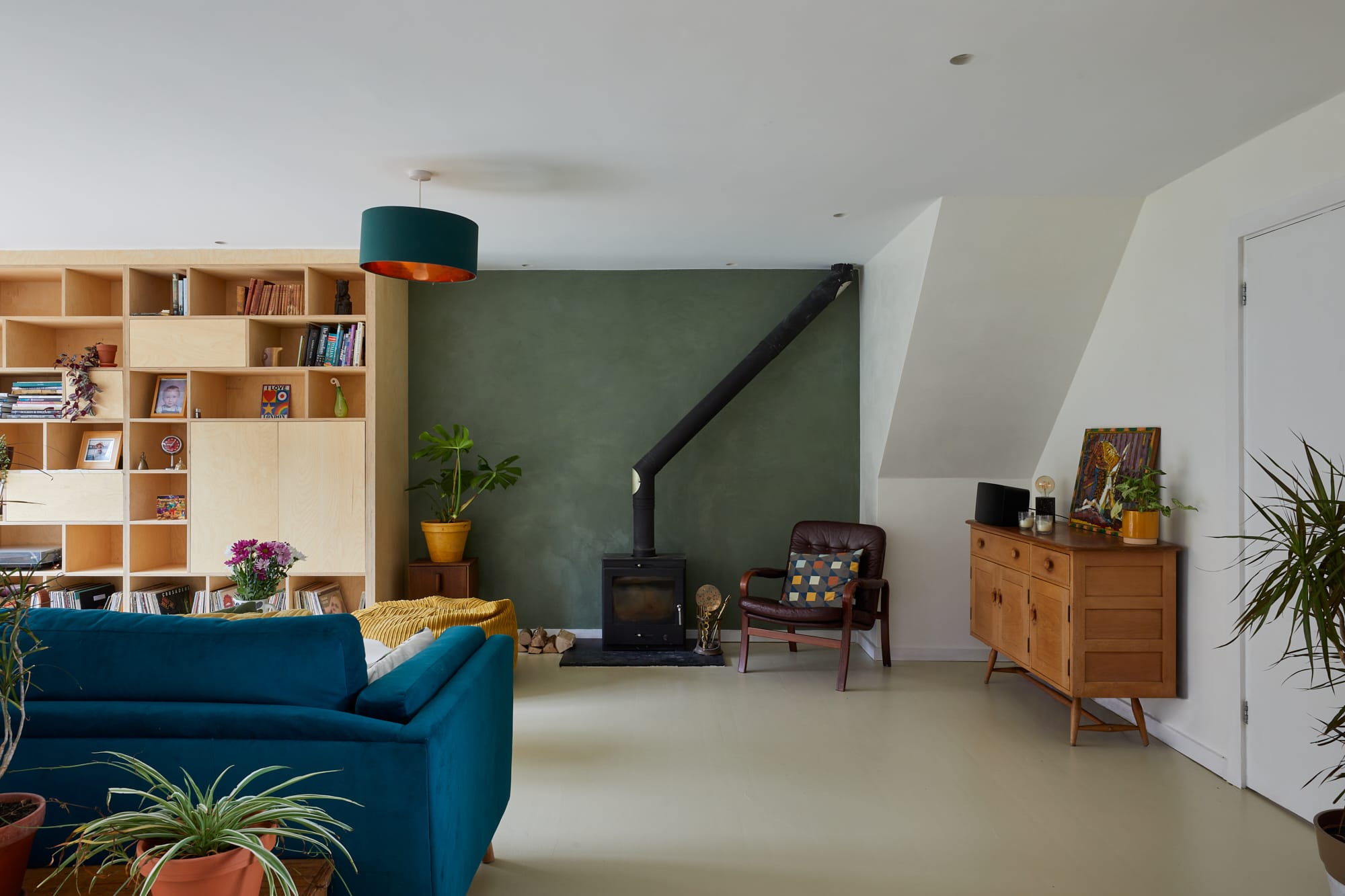 Green and white venetian plaster walls in living room area