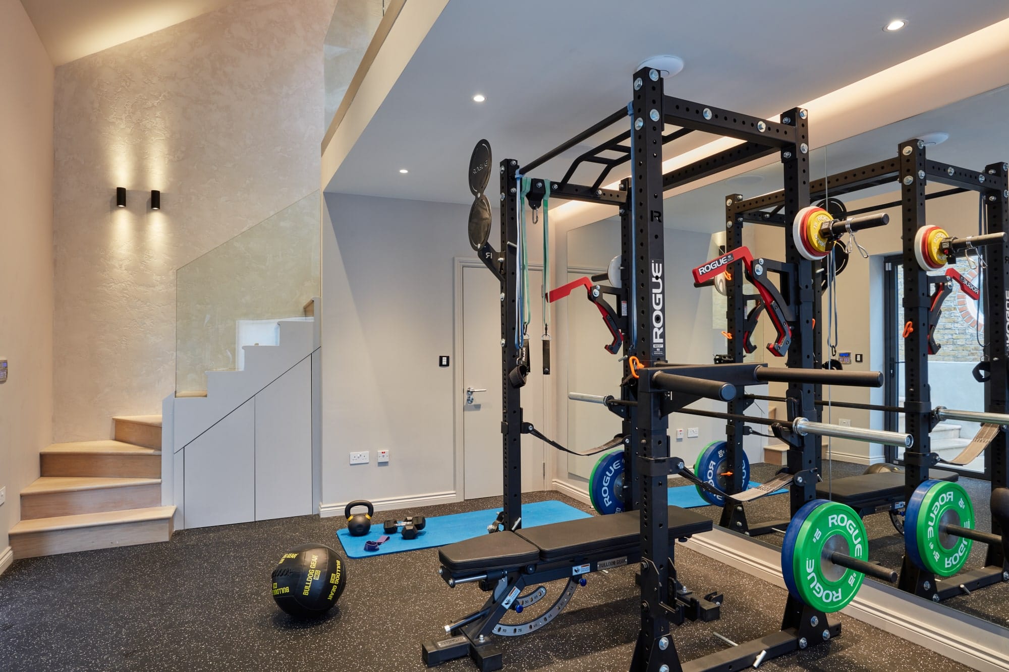 venetian plaster walls in gym area. marmarino polished plaster skip trowel effect for a textured finish